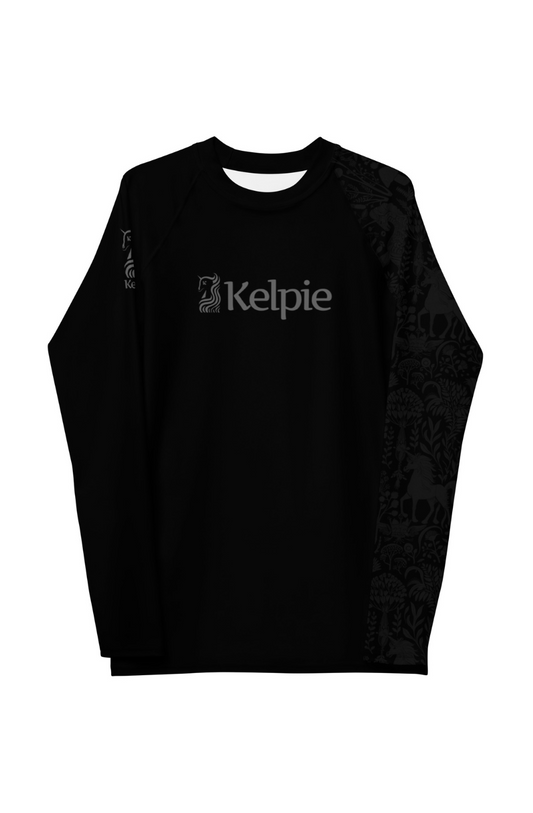 Kelpie Men's Paddle Board Rashguard in Black with a subtle pattern on the left sleeve.